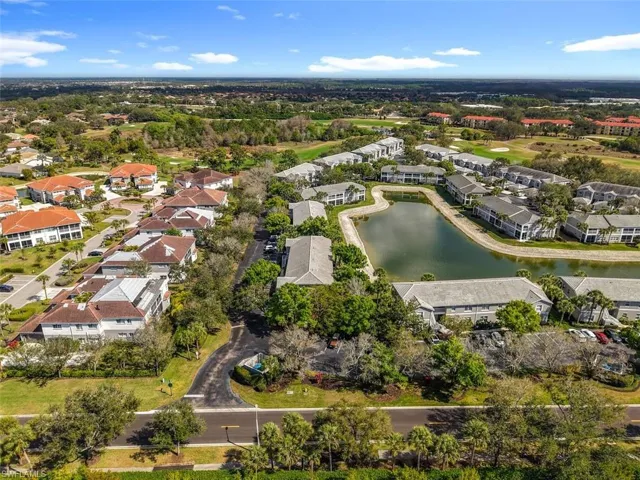 Aerial view of residential area with a large body of water