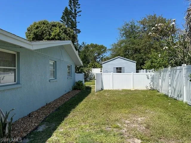 Right Side View of the Home- Gates on Both Sides