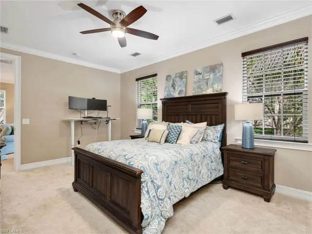 Primary Bedroom with Crown Molding