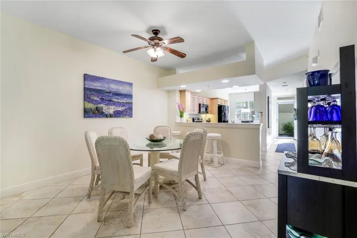 Dining room with ceiling fan, and recessed lighting