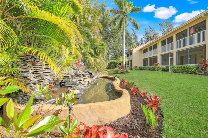 View of home's of waterfall in back of property