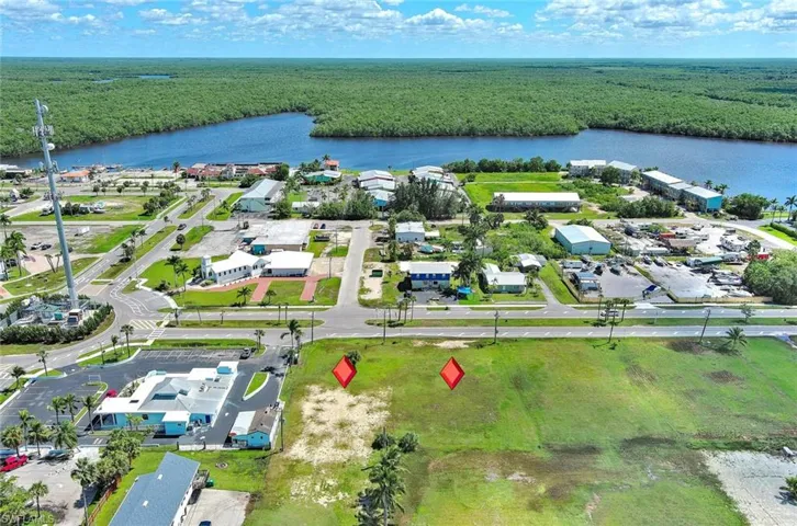 Drone / aerial view of a bay of water plus both lots