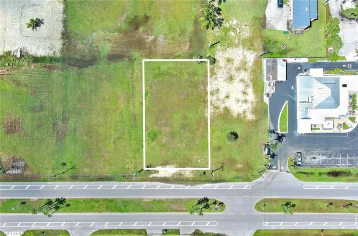 Aerial overview of property's location with property boundaries highlighted.