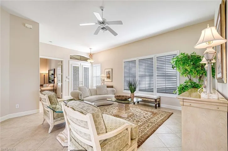 Tiled living room with ceiling fan