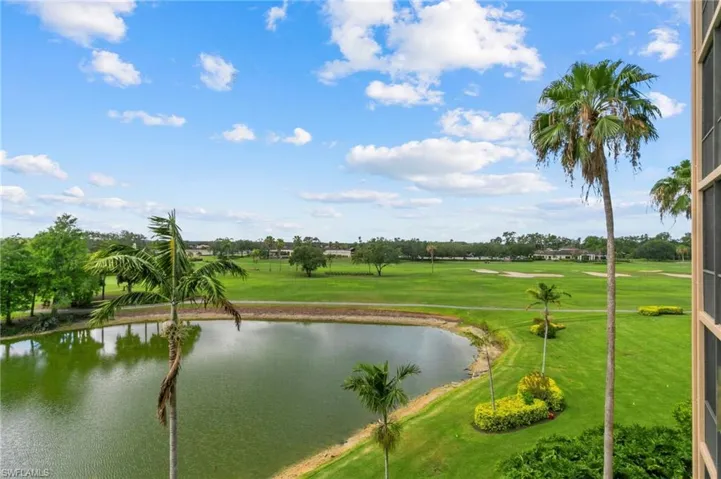 View of community with a water view and golf course