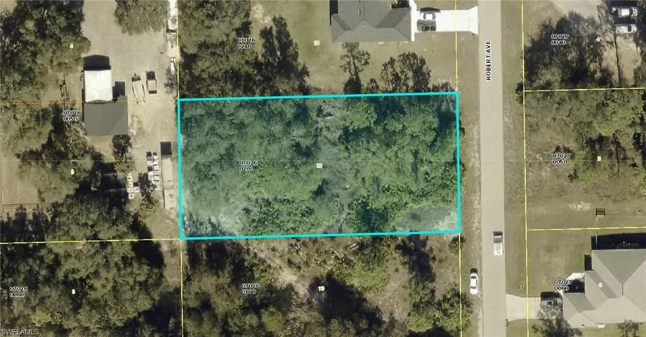 Aerial map of property and surrounding area featuring property parcel outlined