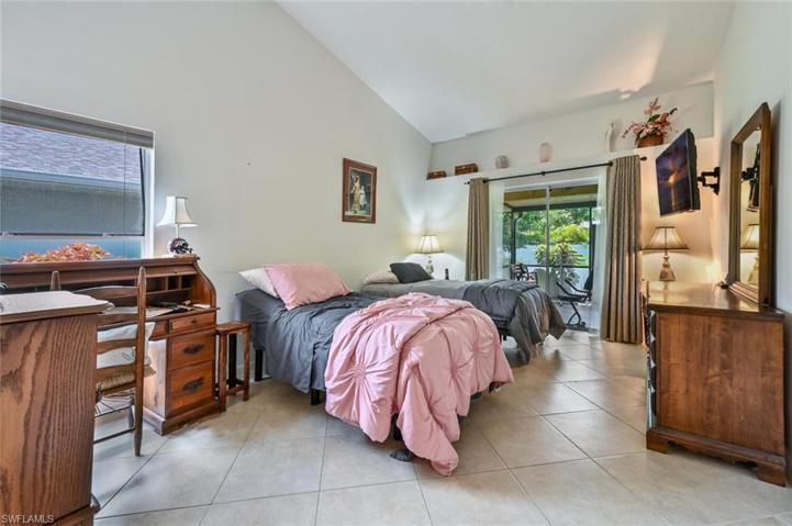 Main Bedroom with sliding door to the lanai