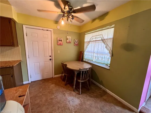 dining room with ceiling fan