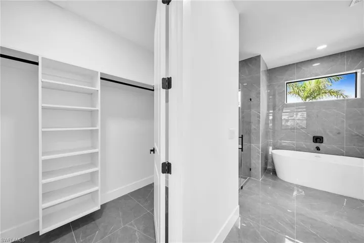 Bathroom featuring independent shower and bath