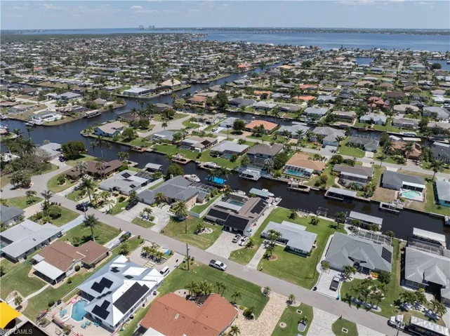 Bird's eye view featuring a water view and a residential view