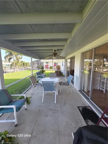 View of patio featuring a ceiling fan