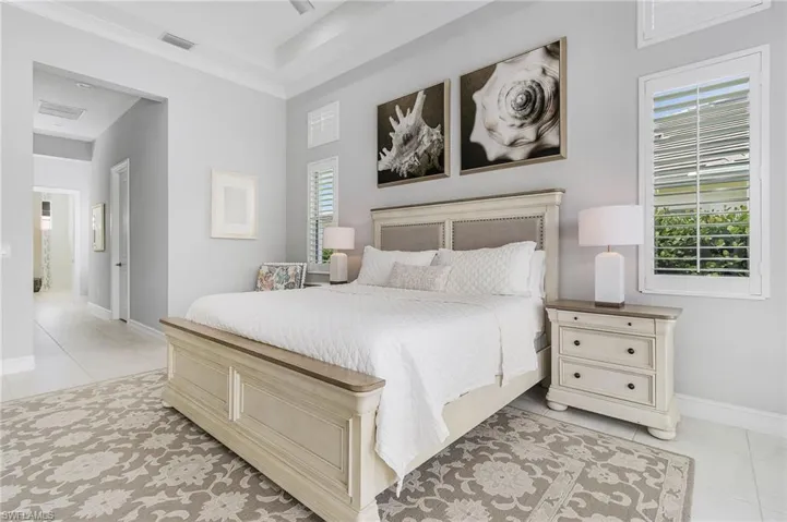 Bedroom with light tile patterned floors