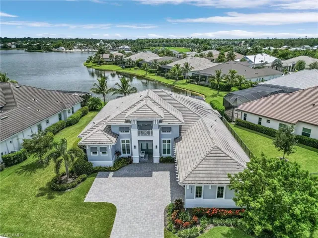 Aerial view of residential area with a nearby body of water