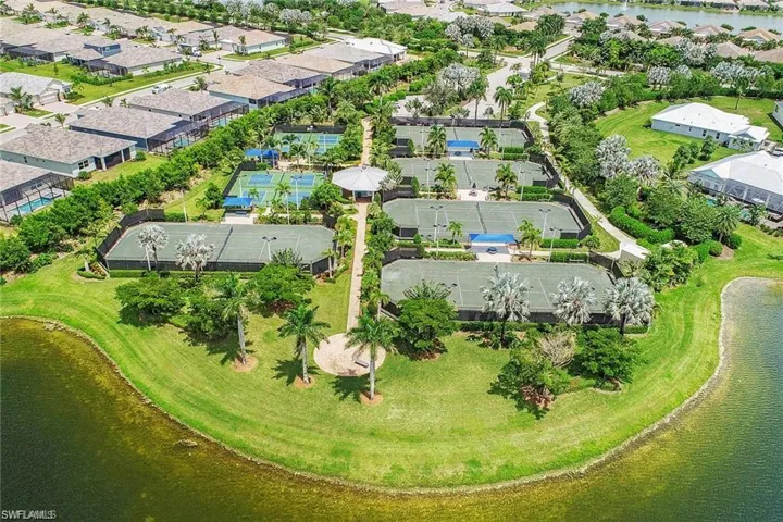 View of property location with nearby suburban area and a large body of water