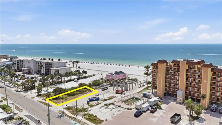 View of property location with property parcel outlined and waterfront with a beachchange color of water into natural dark blue canal water