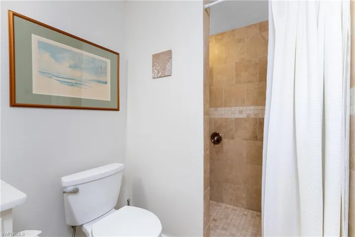 Bathroom with walk in shower and toilet