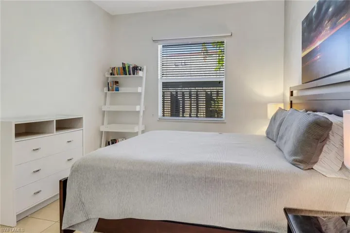 Bedroom featuring light tile patterned flooring