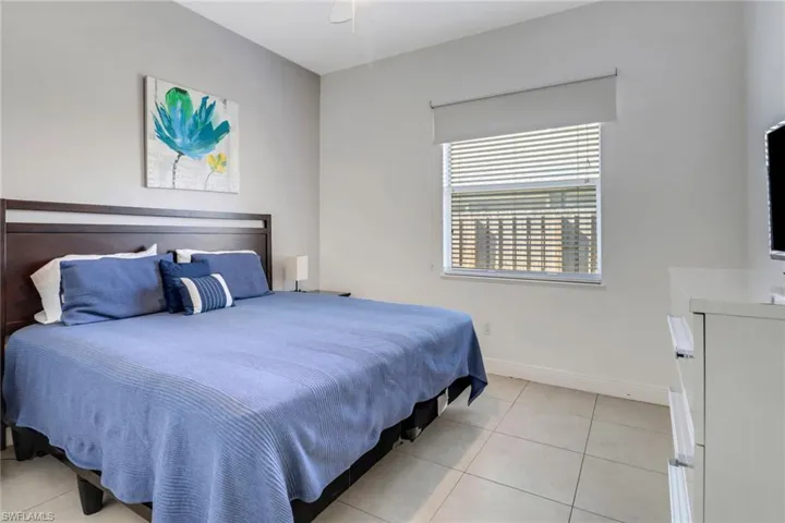 Bedroom featuring ceiling fan and light tile patterned floors