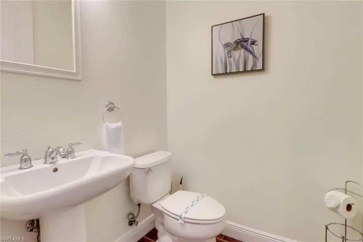 Bathroom featuring toilet and sink