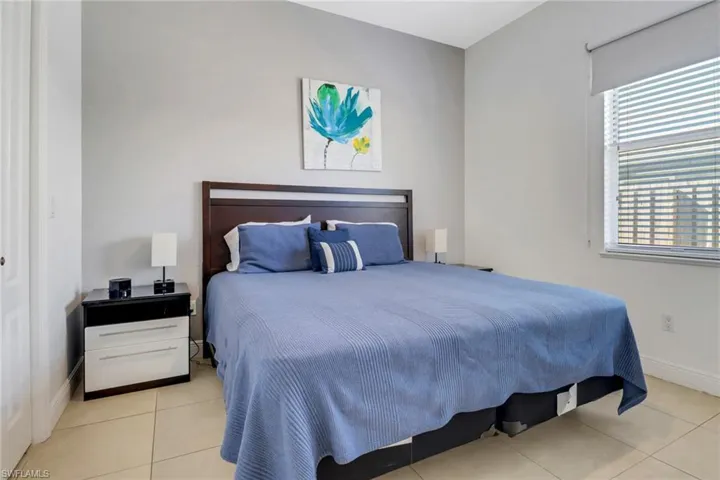 Bedroom featuring light tile patterned floors