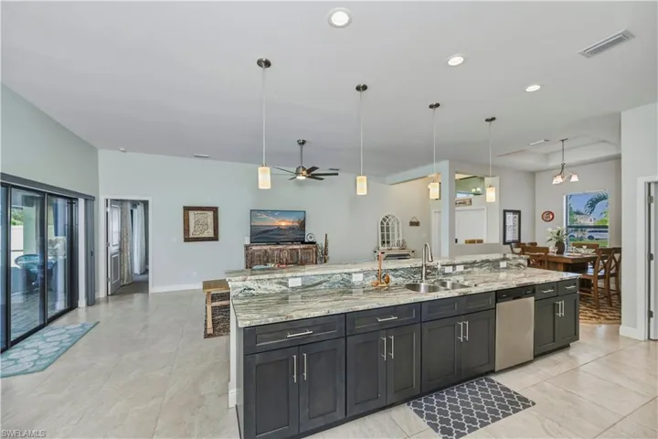 looking from eat in kitchen area to great room and kitchen