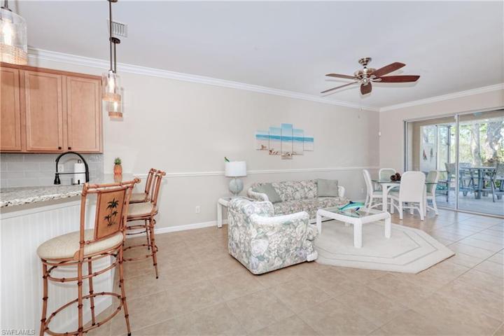 The bar stools and Living room furniture seen here will convey if buyer wishes it so.