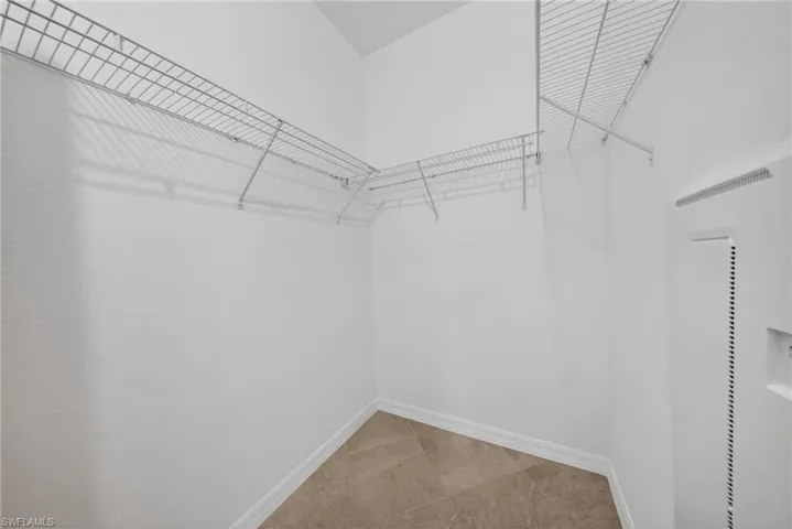 Walk in closet featuring a heating unit