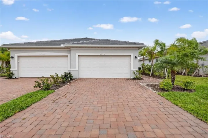 Garage with decorative driveway