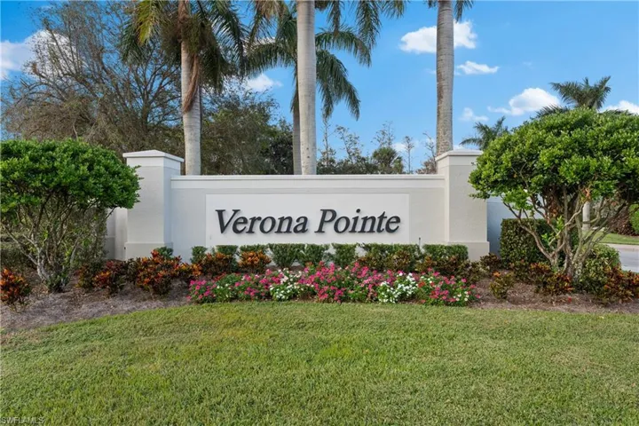 Community / neighborhood sign with a lawn