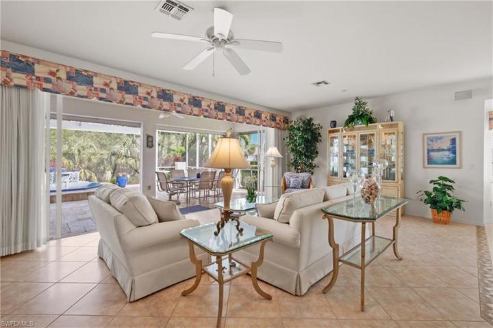 Large Living Room that opens up to Covered/Screened Lanai