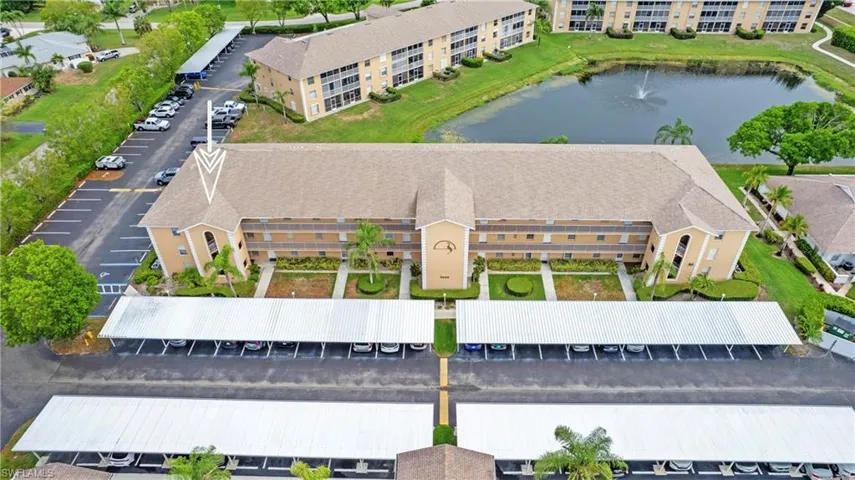 Aerial view of a nearby body of water and apartment complex