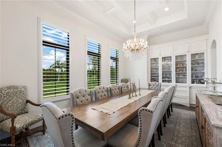 Elegant Dining Rm w builtins and nearby butlers pantry