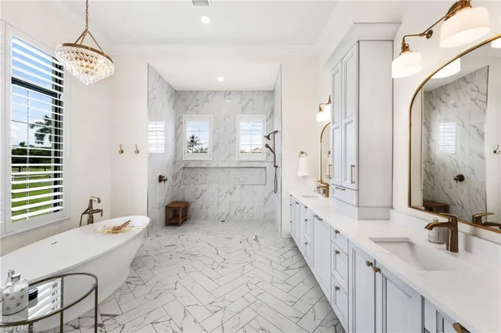 Spacious Primary bath with lots of counters space, dual sinks and designer soaking tub.