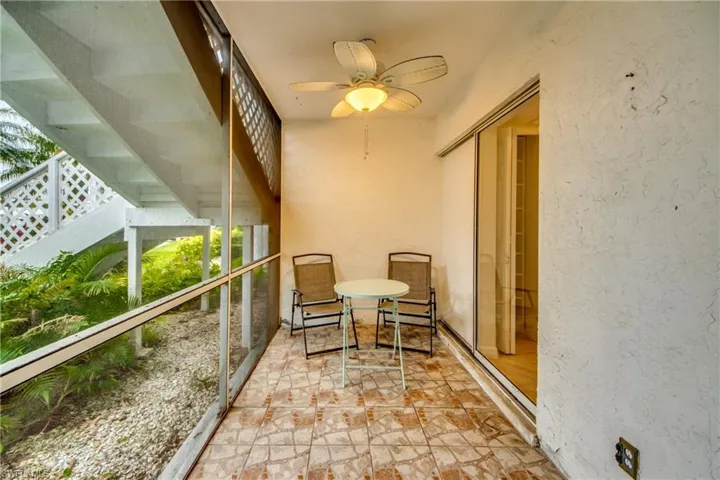 Front screened lanai with ceiling fan