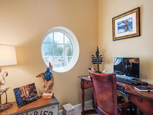 Living area with ceiling fan, ornamental molding, light tile patterned floors, and recessed lighting