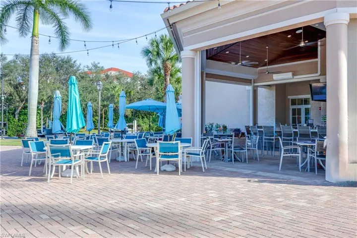 View of patio featuring a ceiling fan and outdoor dining space