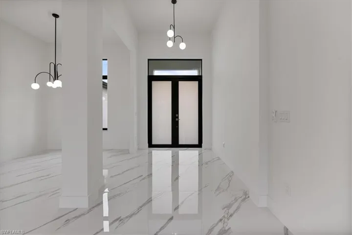Foyer with a chandelier