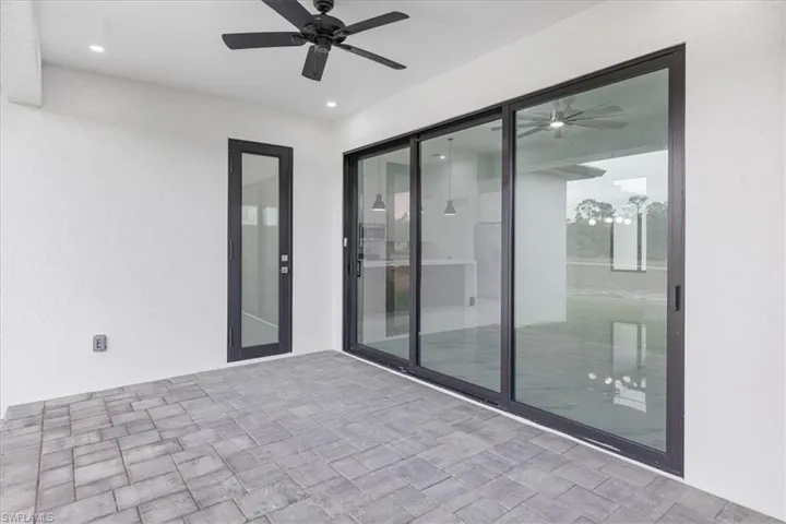 View of patio / terrace featuring ceiling fan