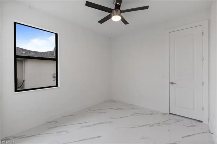 Unfurnished room with ceiling fan