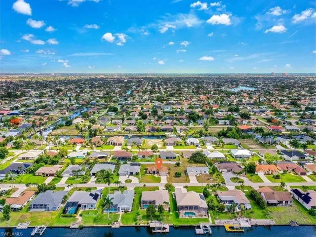 Waterfront community featuring canal access, private boat docks, and individual swimming pools