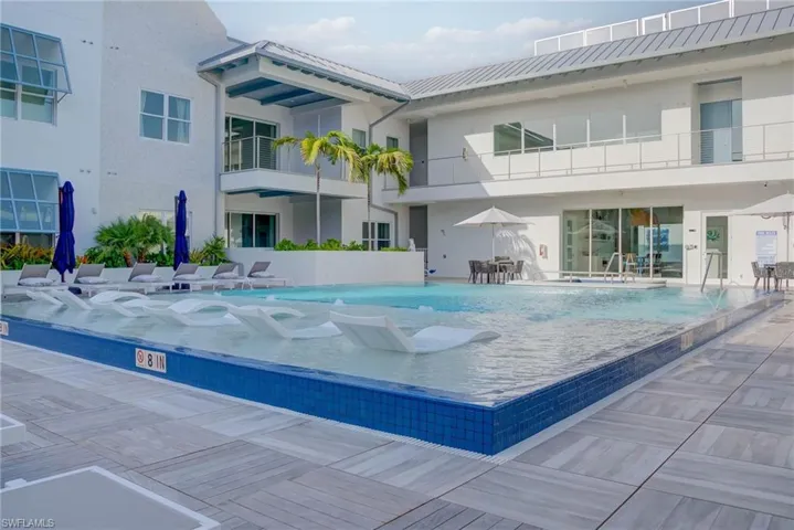 Pool and hit tub on the 2nd floor amenity deck just steps from the unit patio