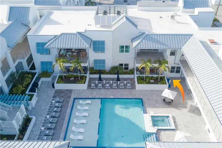 Community pool with a patio area on the 2nd level amenity deck- unit is on this level for easy access