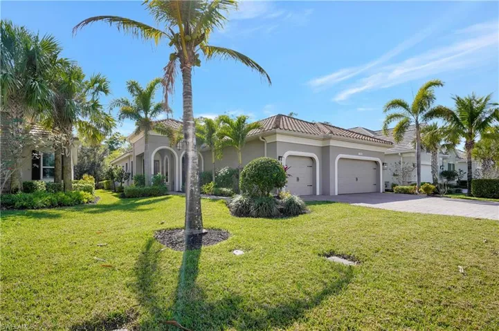 3 BR + Den, 3 BA, pool house with an 3 car attached garage, decorative driveway, and a tiled roof