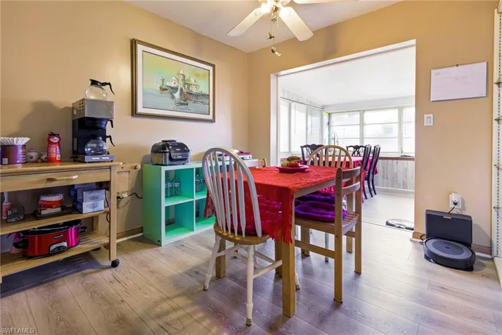 Dining space featuring ceiling fan and hardwood / wood-style floors