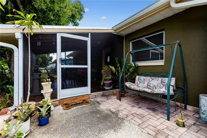 Entrance to property with a patio
