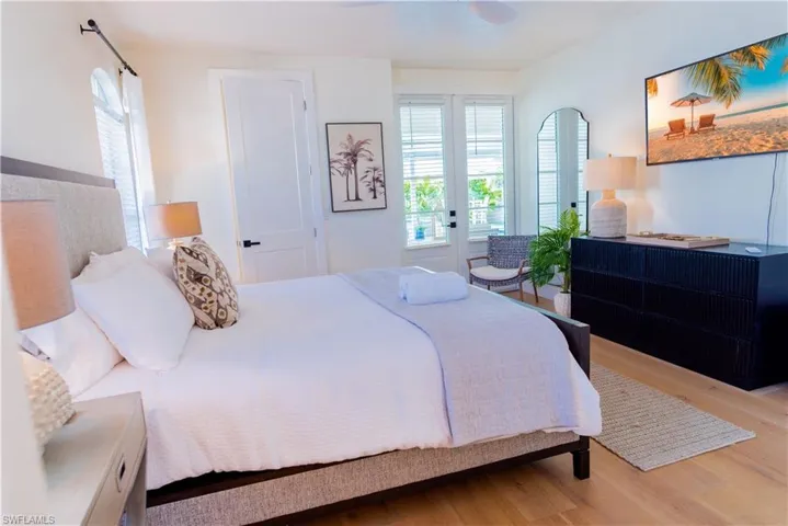 MAIN LEVEL MASTER BEDROOM overlooking the BACKYARD; SPACIOUS PRIMARY BATHROOM and CLOSET