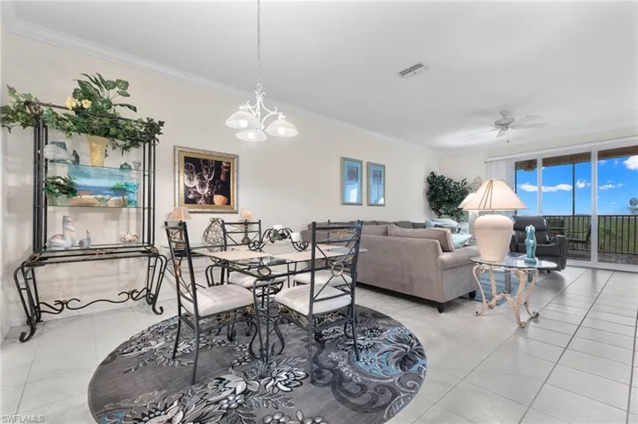 Dining area off kitchen with a great view out to lanai and preserve.