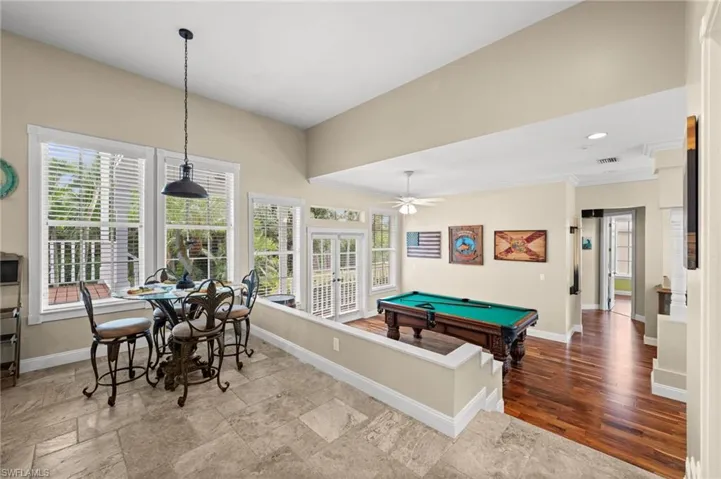 Game room featuring ornamental molding, billiards, and ceiling fan