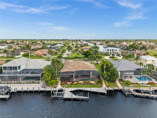 Aerial view of residential area with a nearby body of water