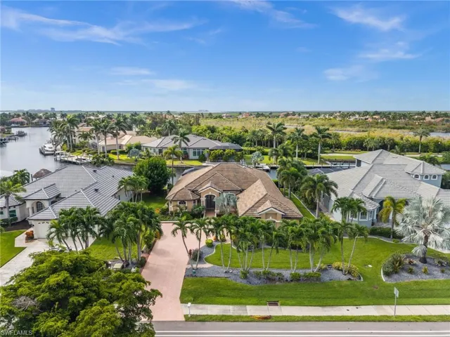 Aerial view of residential area with a nearby body of water